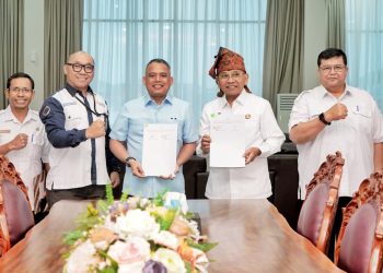 Bupati Simalungun Anton Achmad Saragih saat jalin kerjasama dengan PT Bank Sumut ( Diskominfo Simalungun )