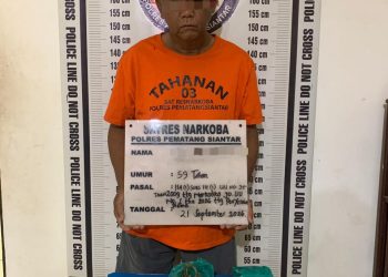 Pelaku penyalahgunaan Narkotika jenis ganja yang merupakan residivis yang diamankan Polisi ( Humas Polres Pematangsiantar )