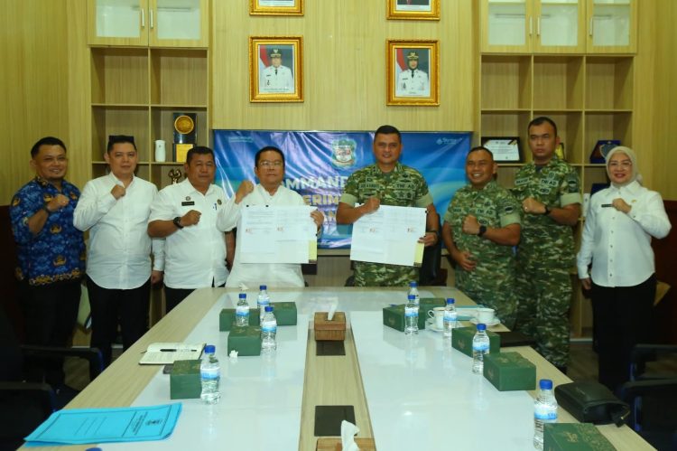 Pemerintah Kota Pematangsiantar saat tanda tangani kerja sama program Karya Bhakti TNI bersama Kodim 0207/Simalungun. ( Diskominfo Kota Pematangsiantar )