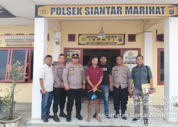 Karyawan Toko Bangunan yang melakukan pencurian yang diamankan Polisi. ( Humas Polres Pematangsiantar )