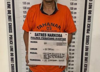Pria pelaku penyalahgunaan Narkotika jenis ganja yang diamankan polisi. ( Humas Polres Pematangsiantar )